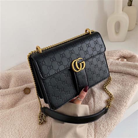 harga tas gucci selempang original